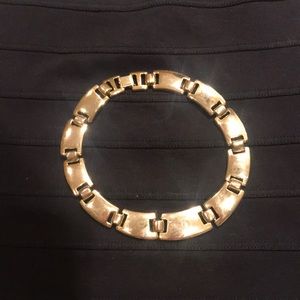 Gold tone choker necklace